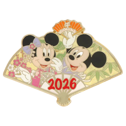 Fan-shaped pin with Mickey and Minnie Mouse, traditional Japanese clothing, and '2026' on a white background