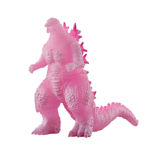 Pink Godzilla figurine on a white background